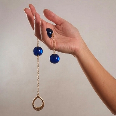 Anaalballen aan gouden ketting / Chapelet Femme Pénétrant